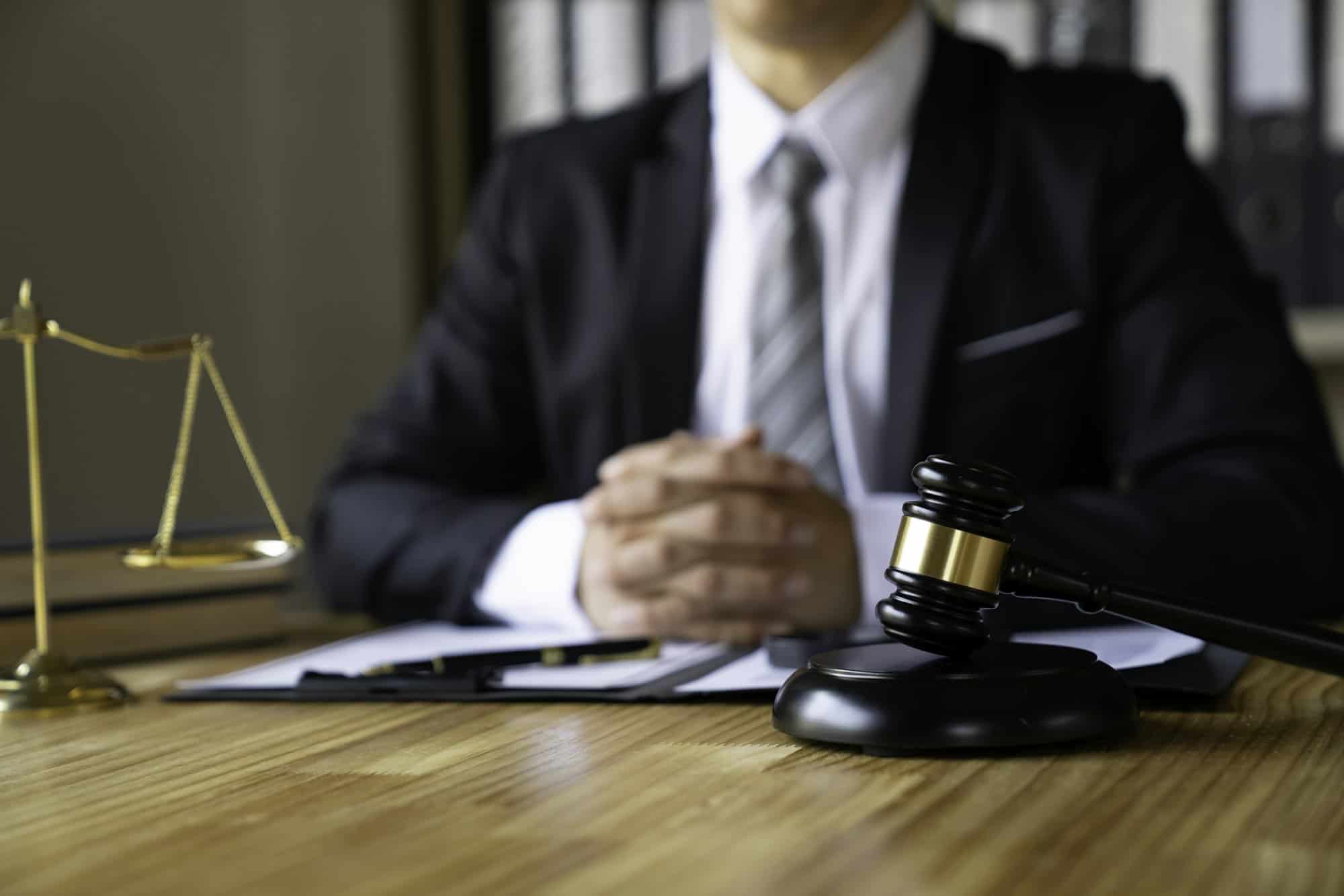 attorney-reading-law-code-studying-constitution-to-protect-human-rights-closeup-male-lawyer-or-jud