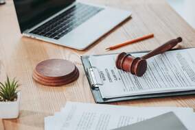 clipboard-with-compensation-claim-form-and-gavel-l-2024-11-17-09-22-25-utc-min