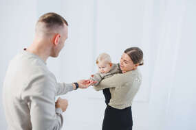 young-parents-mom-and-dad-are-playing-with-a-baby-2025-08-11-22-04-48-utc