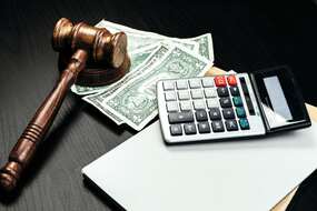 business-finance-corruption-concept-wooden-gavel-2025-02-24-12-09-59-utc-min