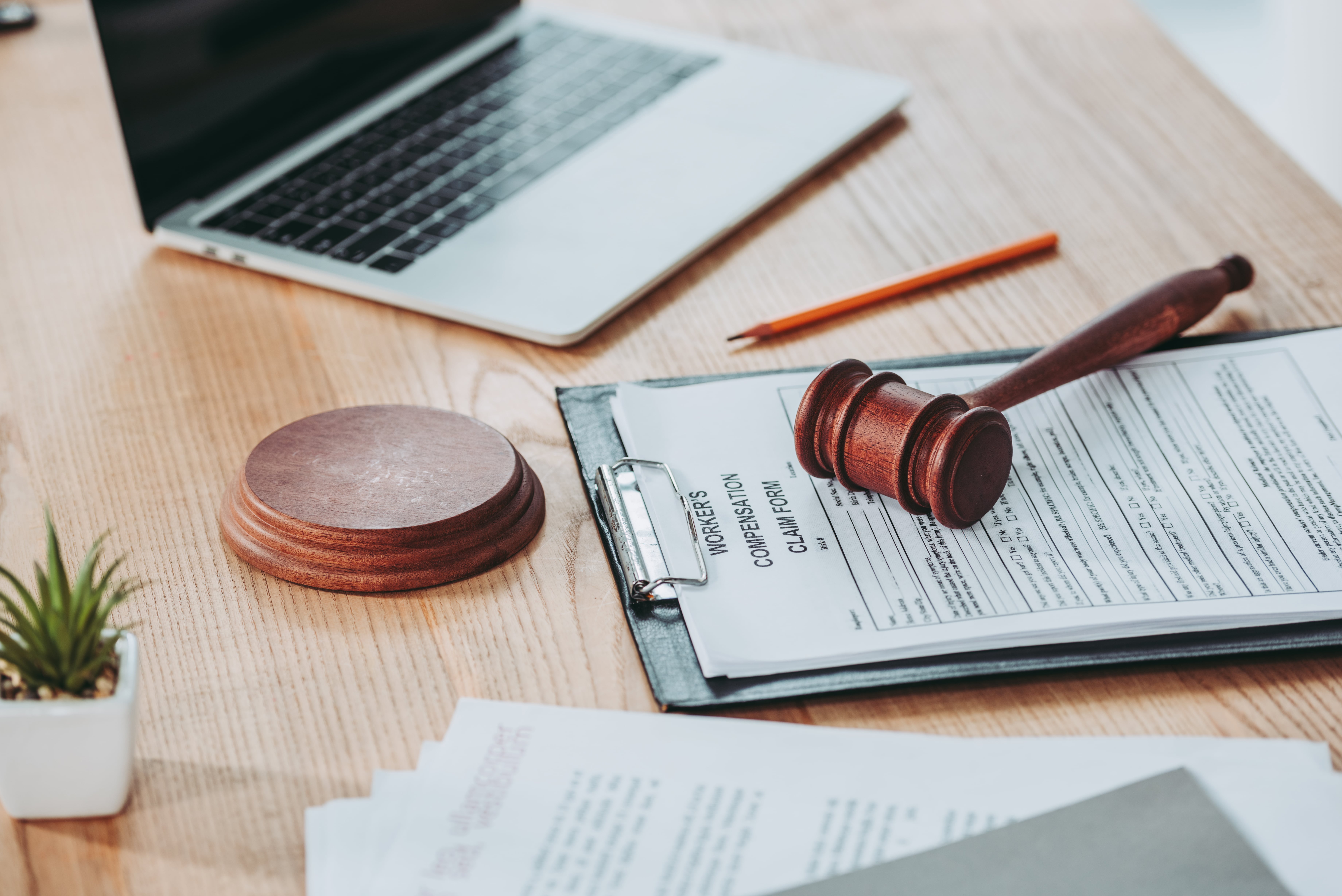 clipboard-with-compensation-claim-form-and-gavel-l-2024-11-17-09-22-25-utc-min